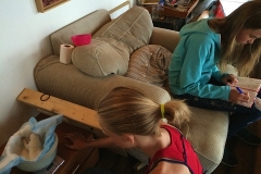 23-02. Girls weighing puppies 2