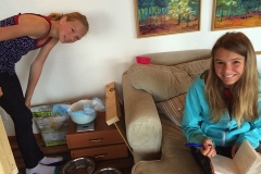 23-04. Girls weighing puppies 4